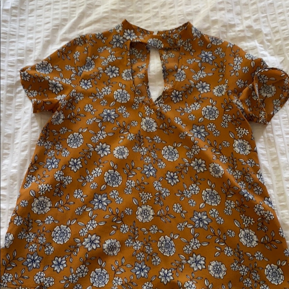 Orange floral blouse